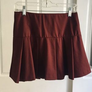 Pleated maroon skirt